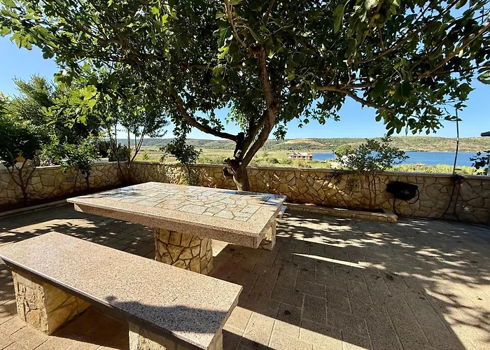 Nyaraló Casa Mare Gartenwohnung *